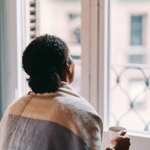 1800x1200_getty_rf_woman_looking_out_window.jpg